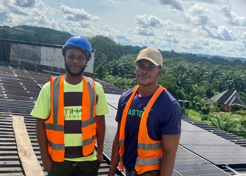 Dreamit engineers at a rooftop solar installation